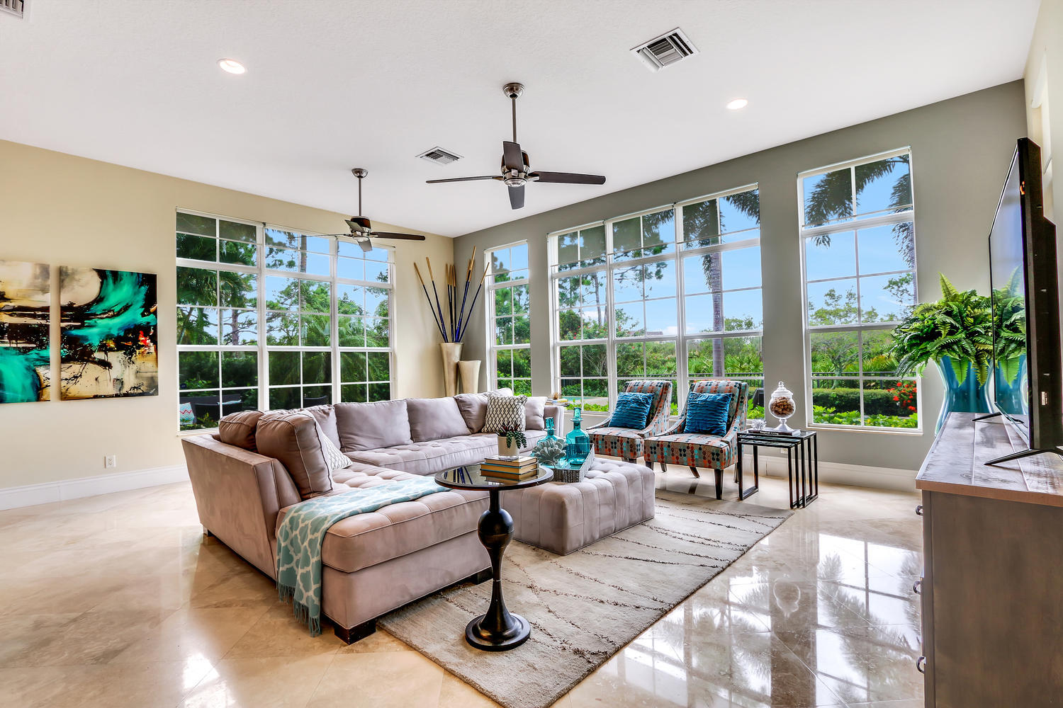 128 Tulip Tree Court Jupiter, FL 33458 - Photo 11 of 35 a living room with furniture and a large window