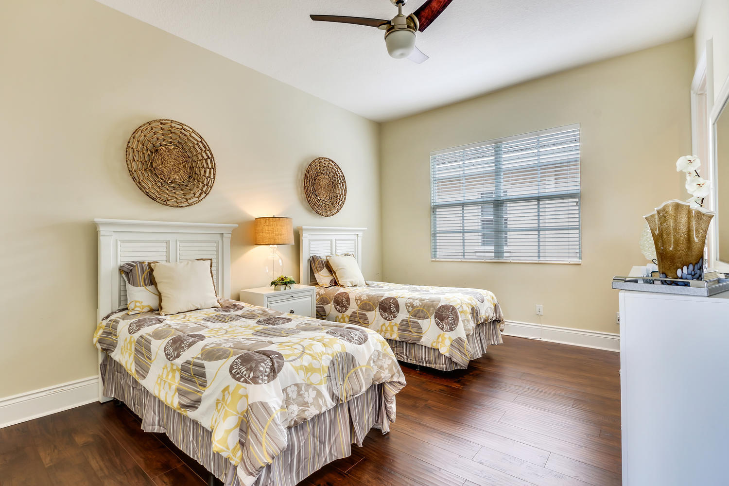 128 Tulip Tree Court Jupiter, FL 33458 - Photo 22 of 35 a bedroom with two beds and a window