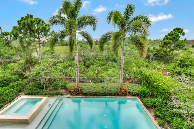 a view of a garden from a balcony