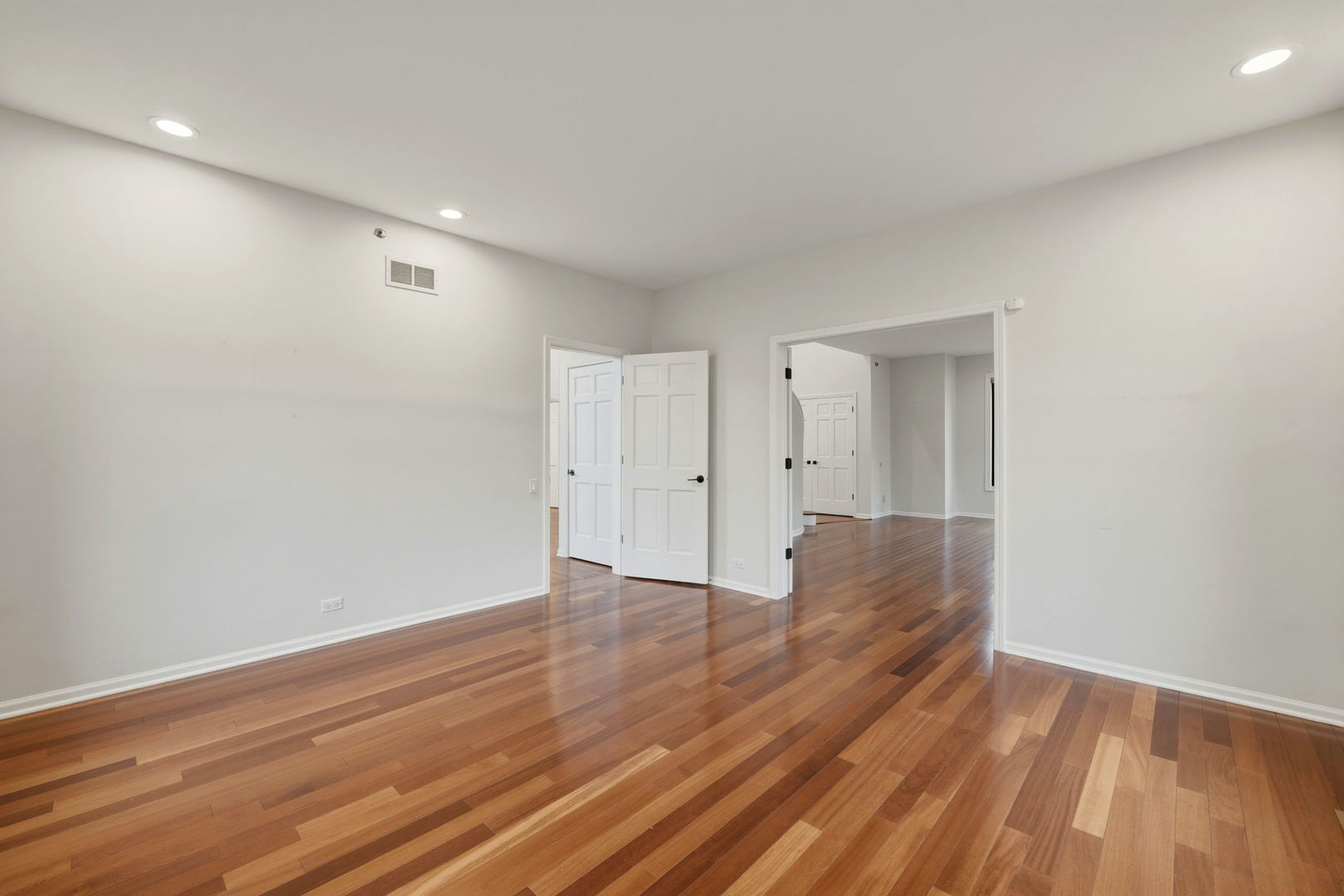 5212 Briarcrest Lane Long Grove, IL 60047 - Photo 22 of 50 a view of an empty room with wooden floor