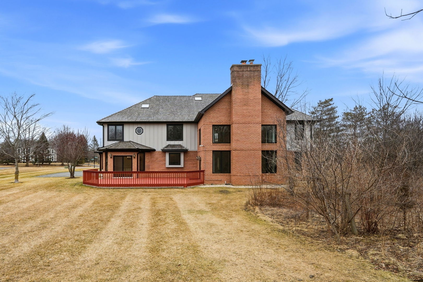 5212 Briarcrest Lane Long Grove, IL 60047 - Photo 43 of 50 a view of a house with a big yard and large trees