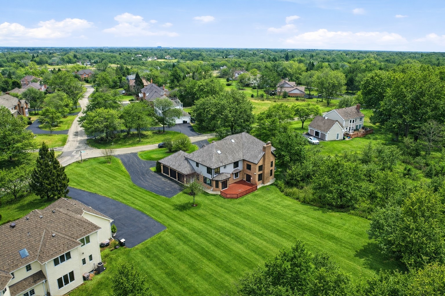 5212 Briarcrest Lane Long Grove, IL 60047 - Photo 48 of 50 an aerial view of a house with a garden and yard