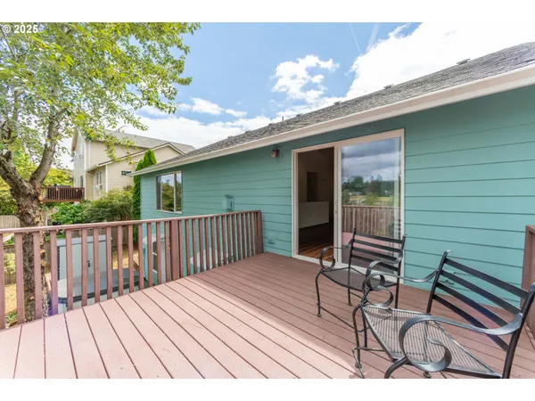 a balcony view with a seating space