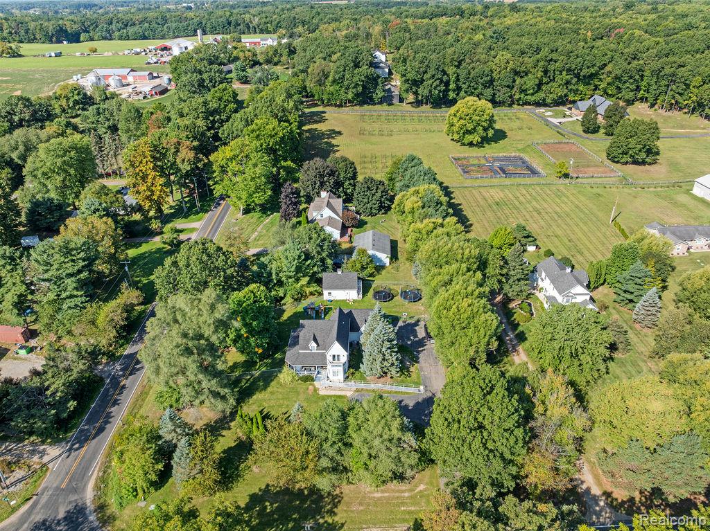 1476 County Farm Road Howell, MI 48843 - Photo 45 of 53 Aerial overview of property's location with rural landscape