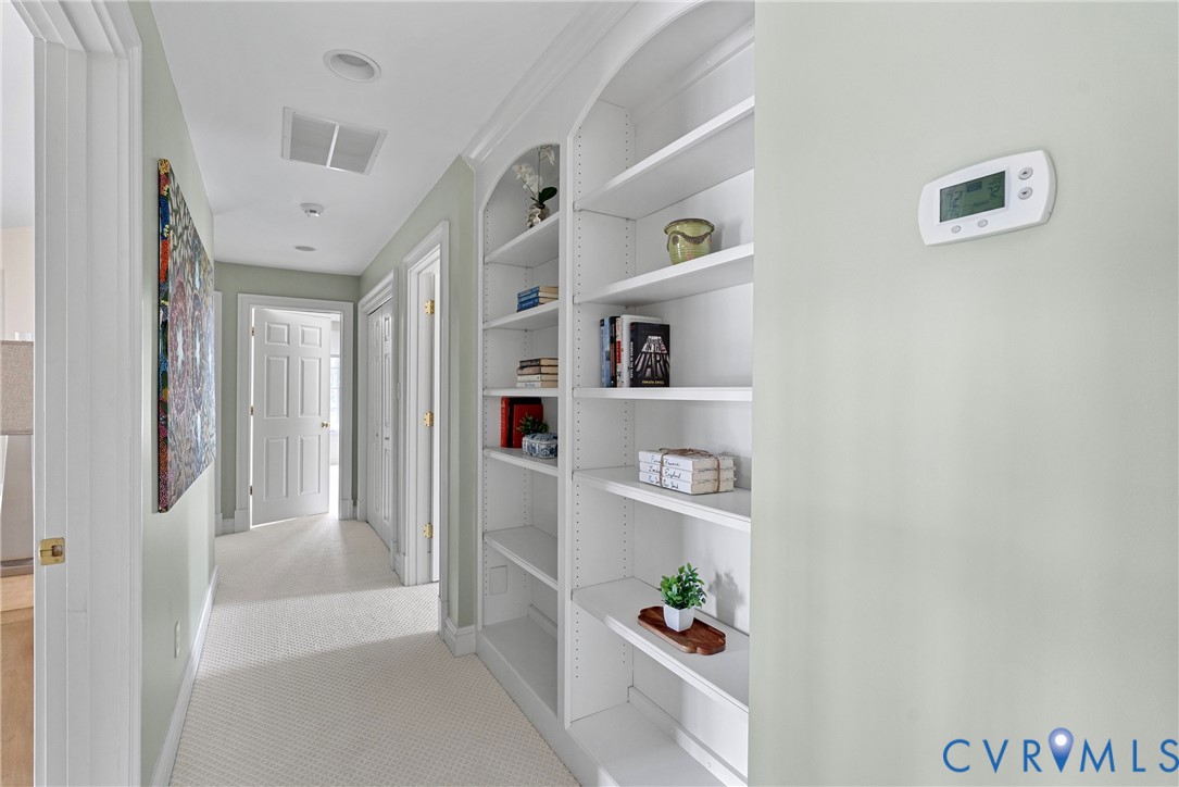 2110 Hawk Town Road Maidens, VA 23102 - Photo 25 of 50 a view of hallway with cabinet and white walls