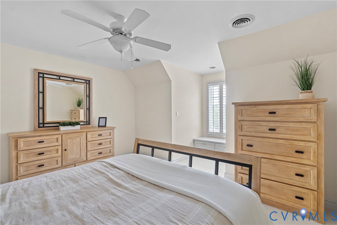 2110 Hawk Town Road Maidens, VA 23102 - Photo 27 of 50 a bedroom with a bed and a dresser