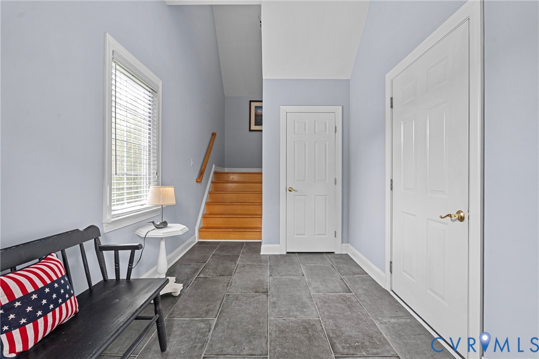 2110 Hawk Town Road Maidens, VA 23102 - Photo 43 of 50 a view of a hallway with windows and stairs