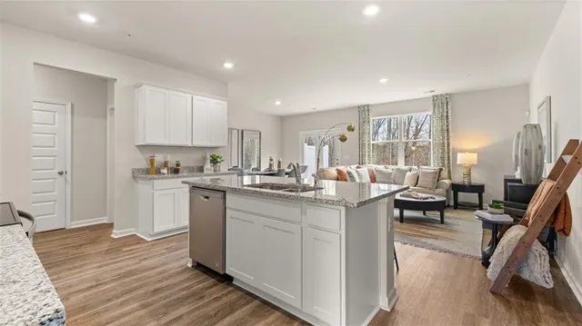 a kitchen with counter top space and cabinets