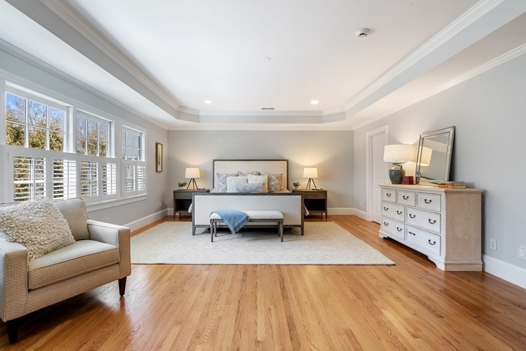 51 Baker Place Newton, MA 02462 - Photo 19 of 38 a bedroom with furniture and a couch