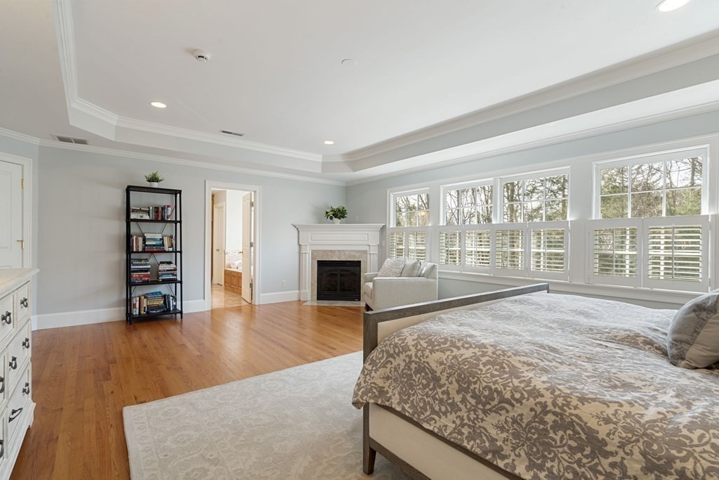 51 Baker Place Newton, MA 02462 - Photo 20 of 38 a view of an empty room with wooden floor and a window
