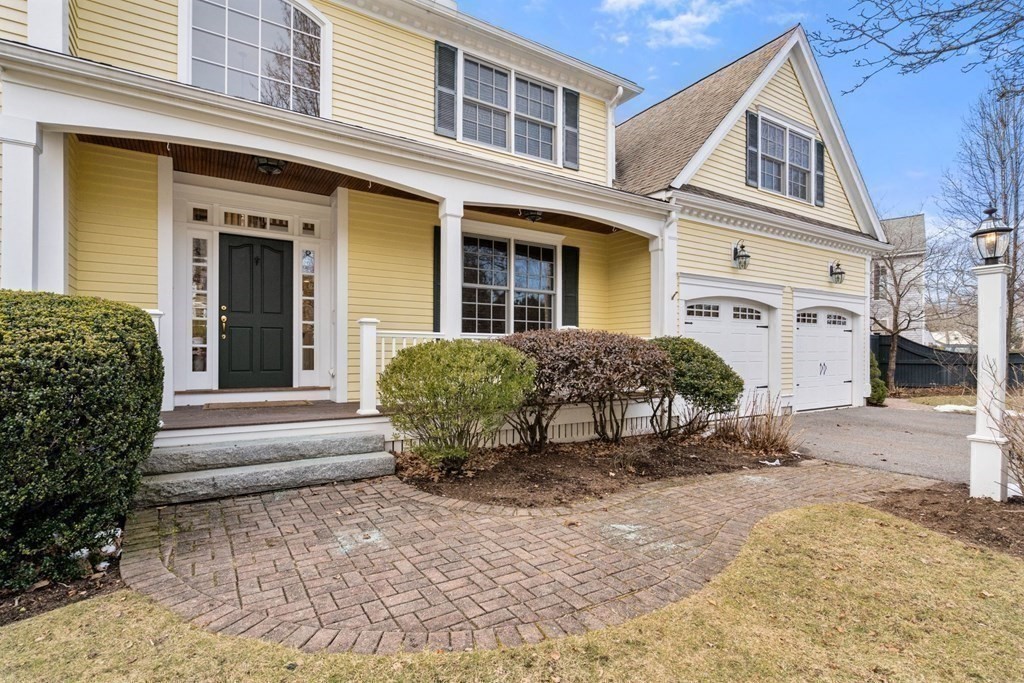 51 Baker Place Newton, MA 02462 - Photo 2 of 38 a view of a house with a yard and sitting space
