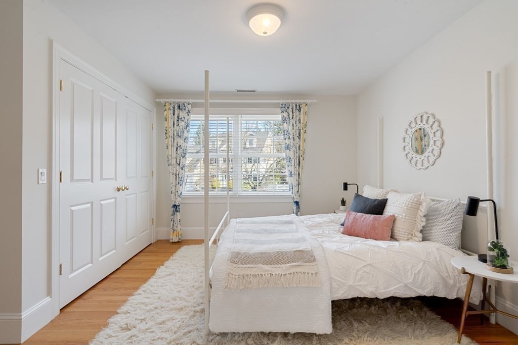 51 Baker Place Newton, MA 02462 - Photo 26 of 38 a bedroom with a bed and a window