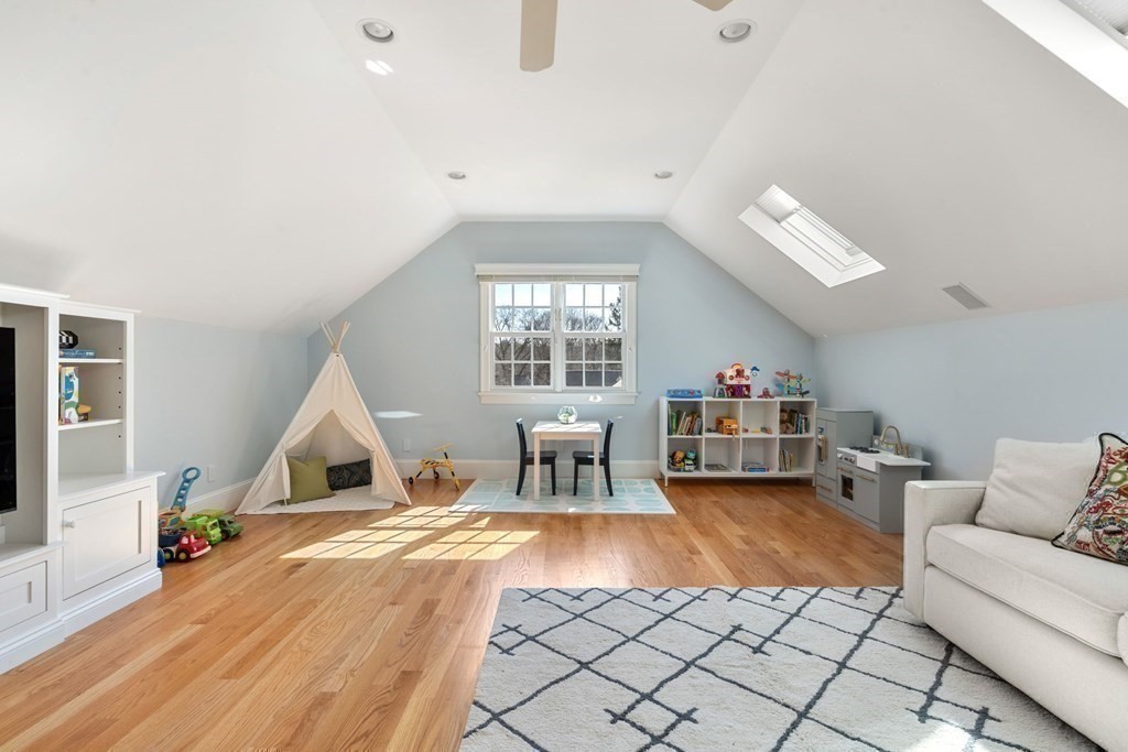 51 Baker Place Newton, MA 02462 - Photo 30 of 38 a living room with furniture and a large window