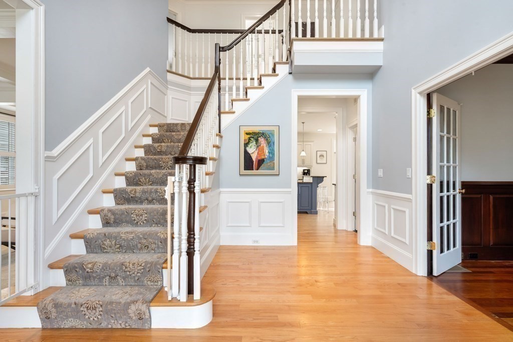 51 Baker Place Newton, MA 02462 - Photo 3 of 38 a view of entryway and hall with wooden floor