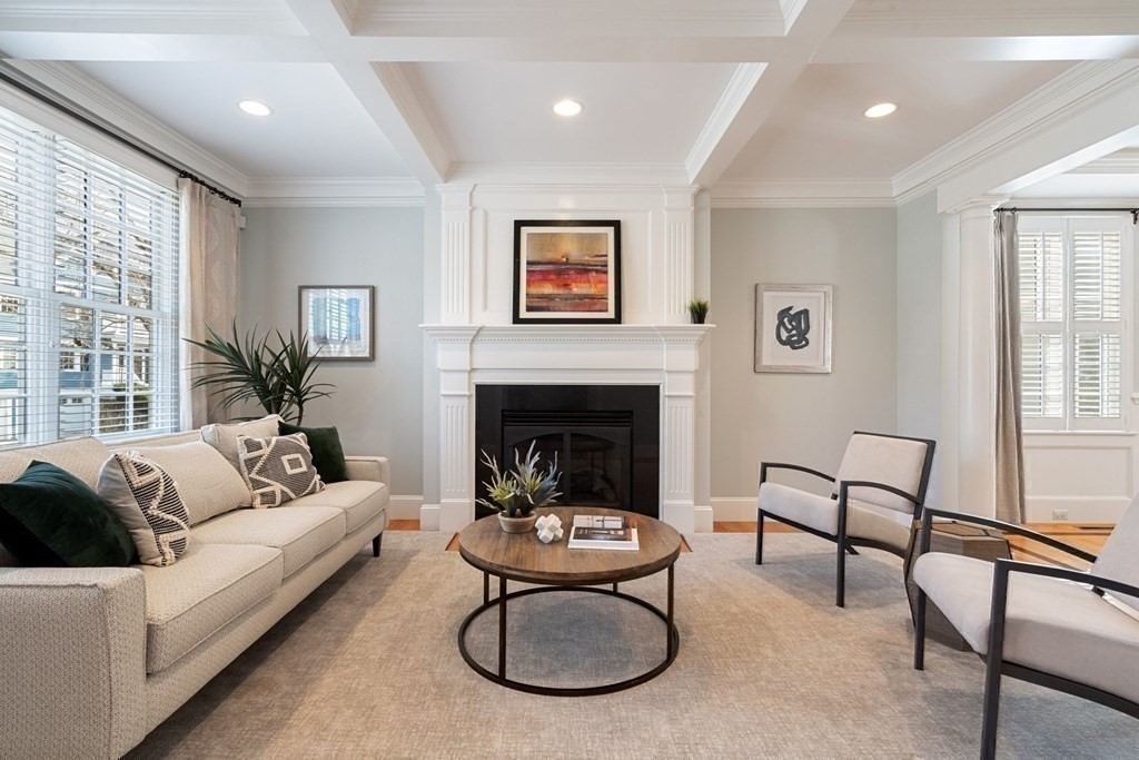 51 Baker Place Newton, MA 02462 - Photo 6 of 38 a living room with furniture and a fireplace
