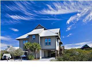 135 Sand Dunes Road Santa Rosa Beach, FL 32459 - Photo 1 of 19 a front view of a house with a yard