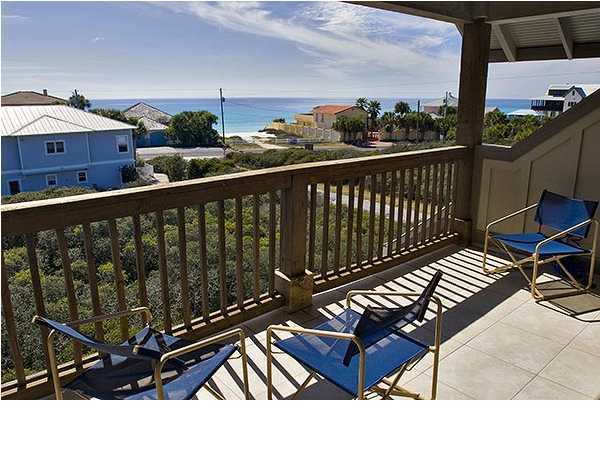 135 Sand Dunes Road Santa Rosa Beach, FL 32459 - Photo 17 of 19 a view of a two chairs and table in the balcony