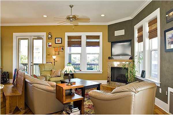 135 Sand Dunes Road Santa Rosa Beach, FL 32459 - Photo 5 of 19 a living room with furniture a fireplace and a flat screen tv