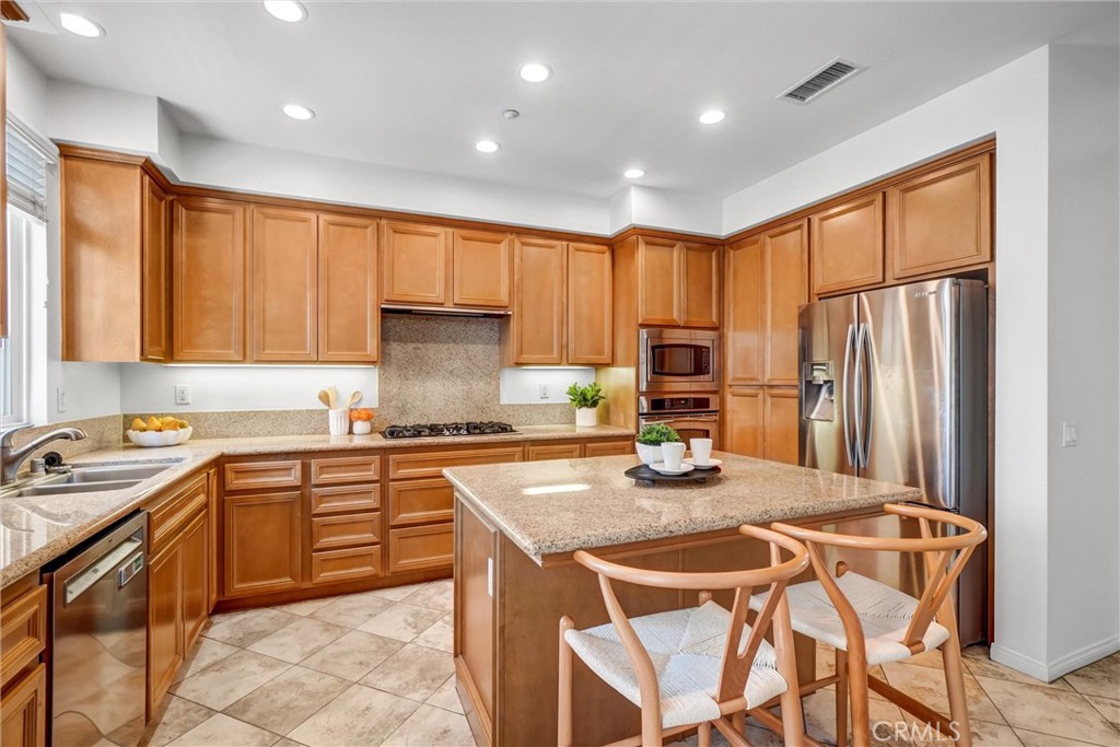 12 Shellprint Court Newport Beach, CA 92663 - Photo 17 of 42 Granite Counters and Tile Flooring