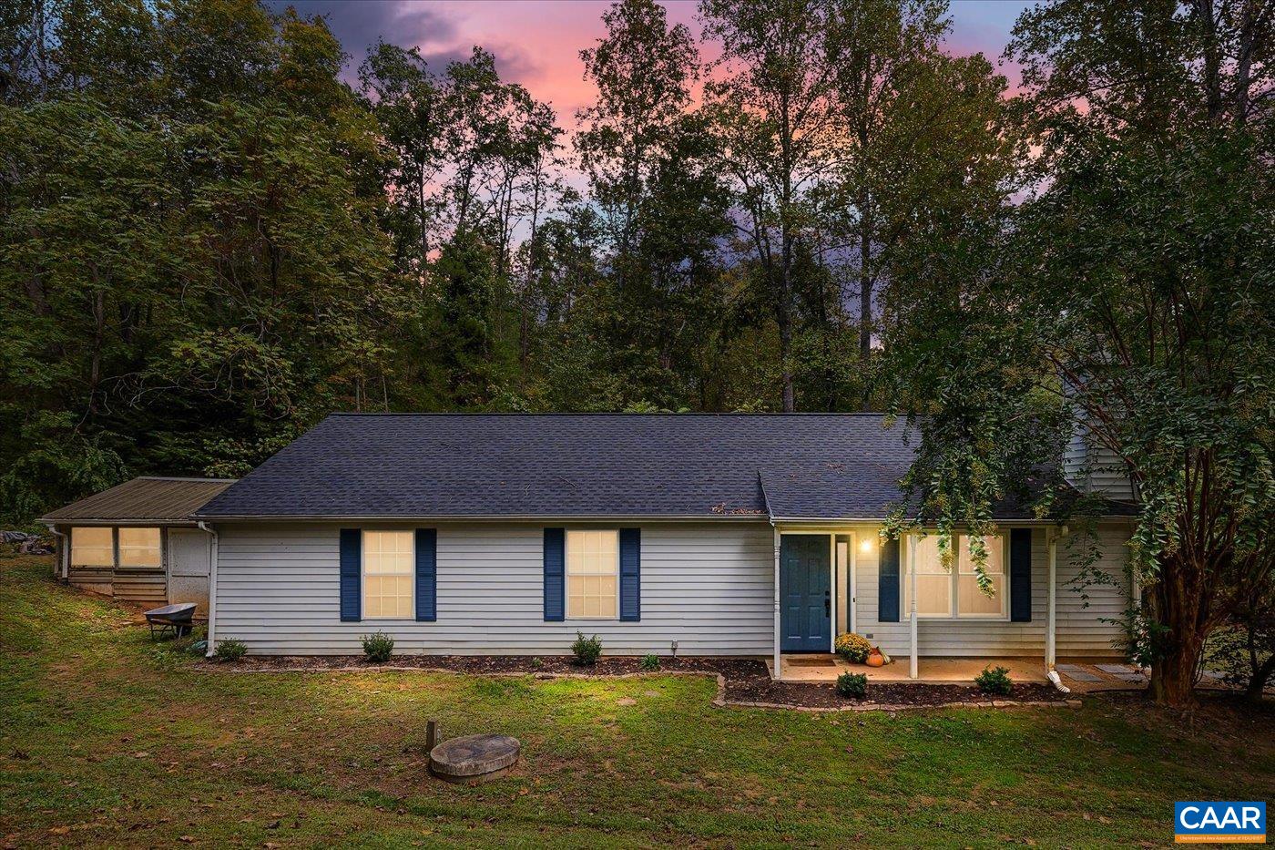 1003 West Daffodil Road Ruckersville, VA 22968 - Photo 1 of 26 a house that has a tree in front of it