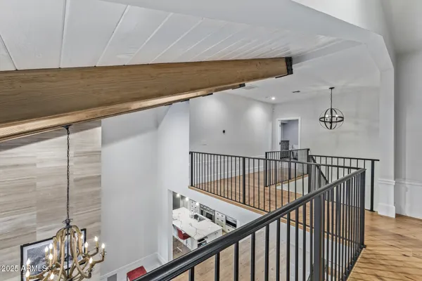 a bathroom with a granite countertop toilet and a sink