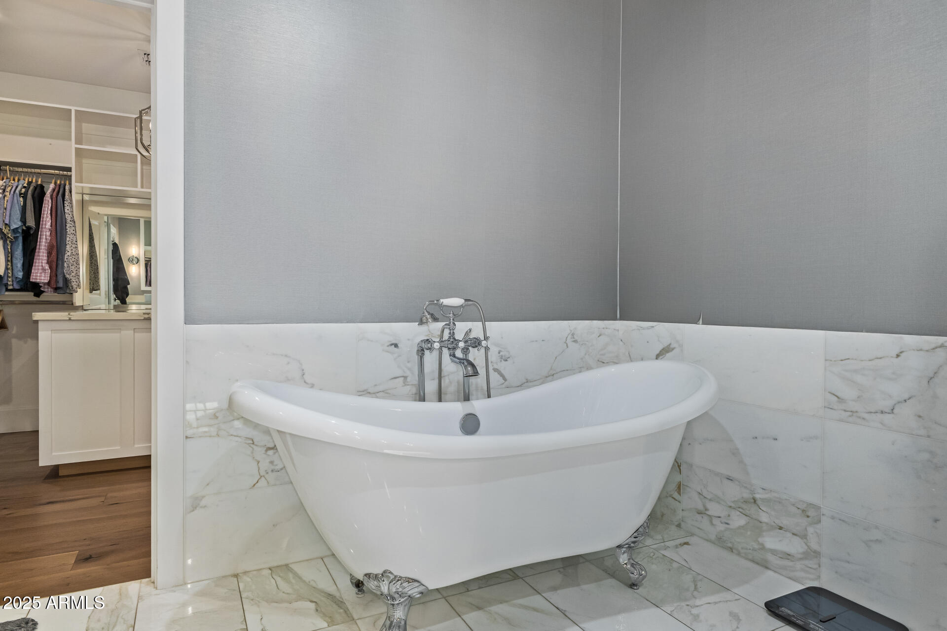 3810 East Campbell Avenue Phoenix, AZ 85018 - Photo 15 of 41 a white bath tub sitting in a bathroom