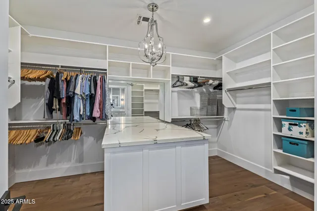 a white bath tub sitting in a bathroom