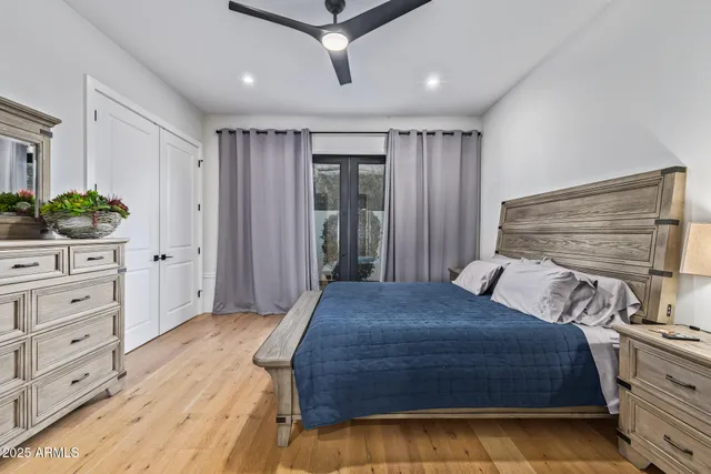 a view of a kitchen with refrigerator and window