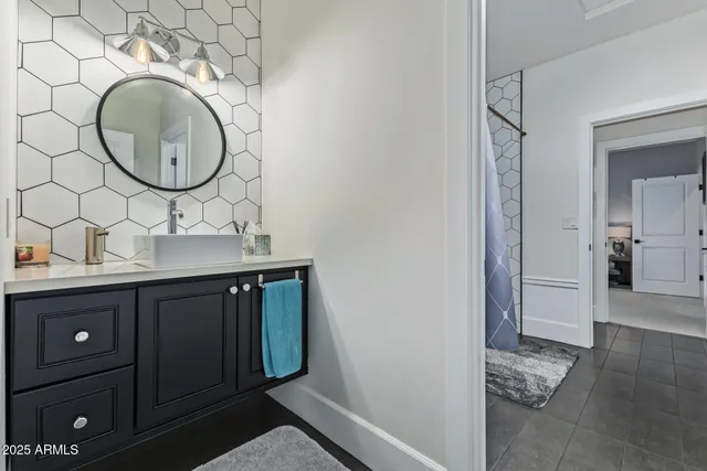 a spacious bedroom with a large bed and a window