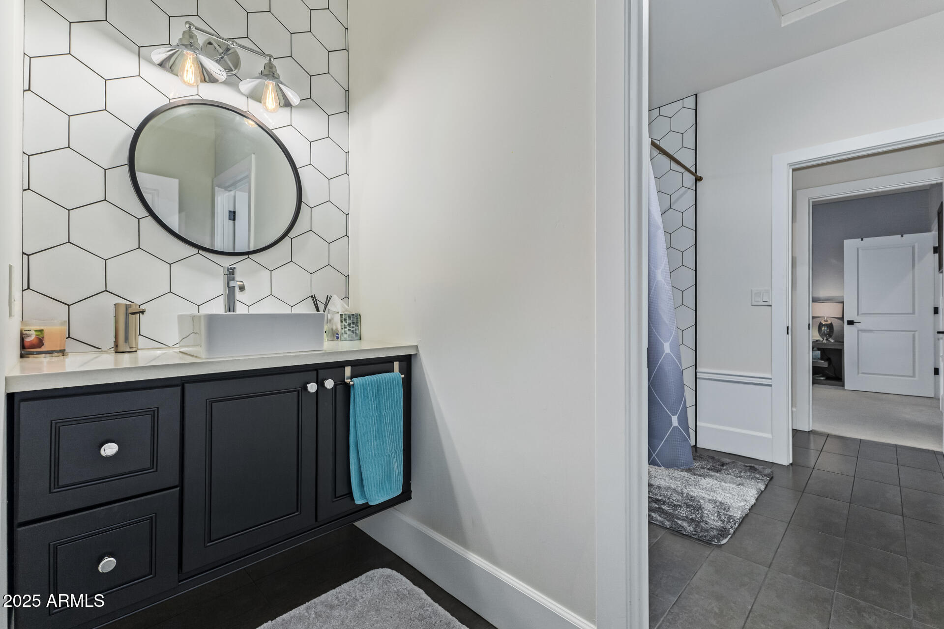 3810 East Campbell Avenue Phoenix, AZ 85018 - Photo 24 of 41 a bathroom with a sink and a mirror