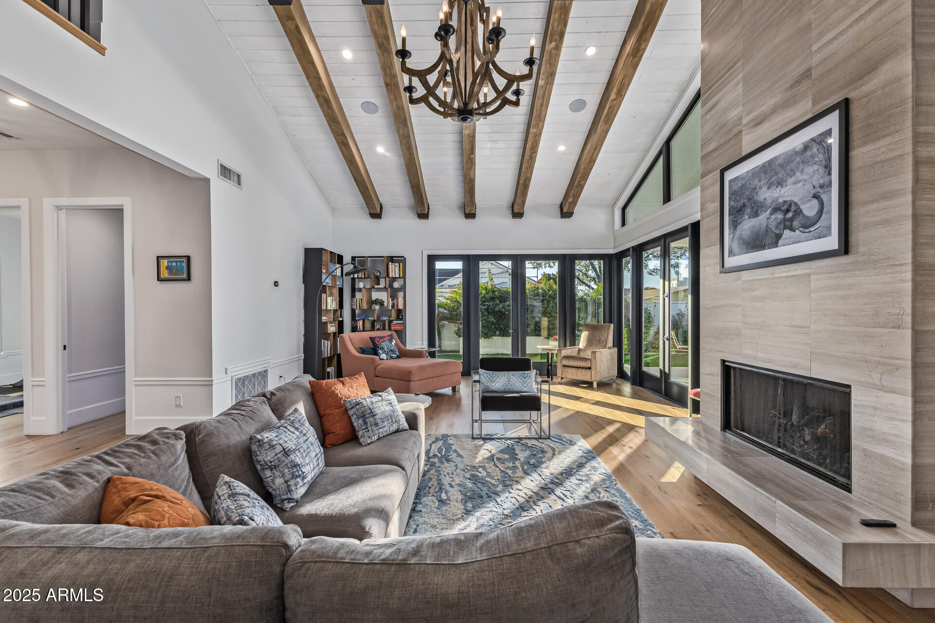3810 East Campbell Avenue Phoenix, AZ 85018 - Photo 34 of 41 a living room with furniture and a fireplace
