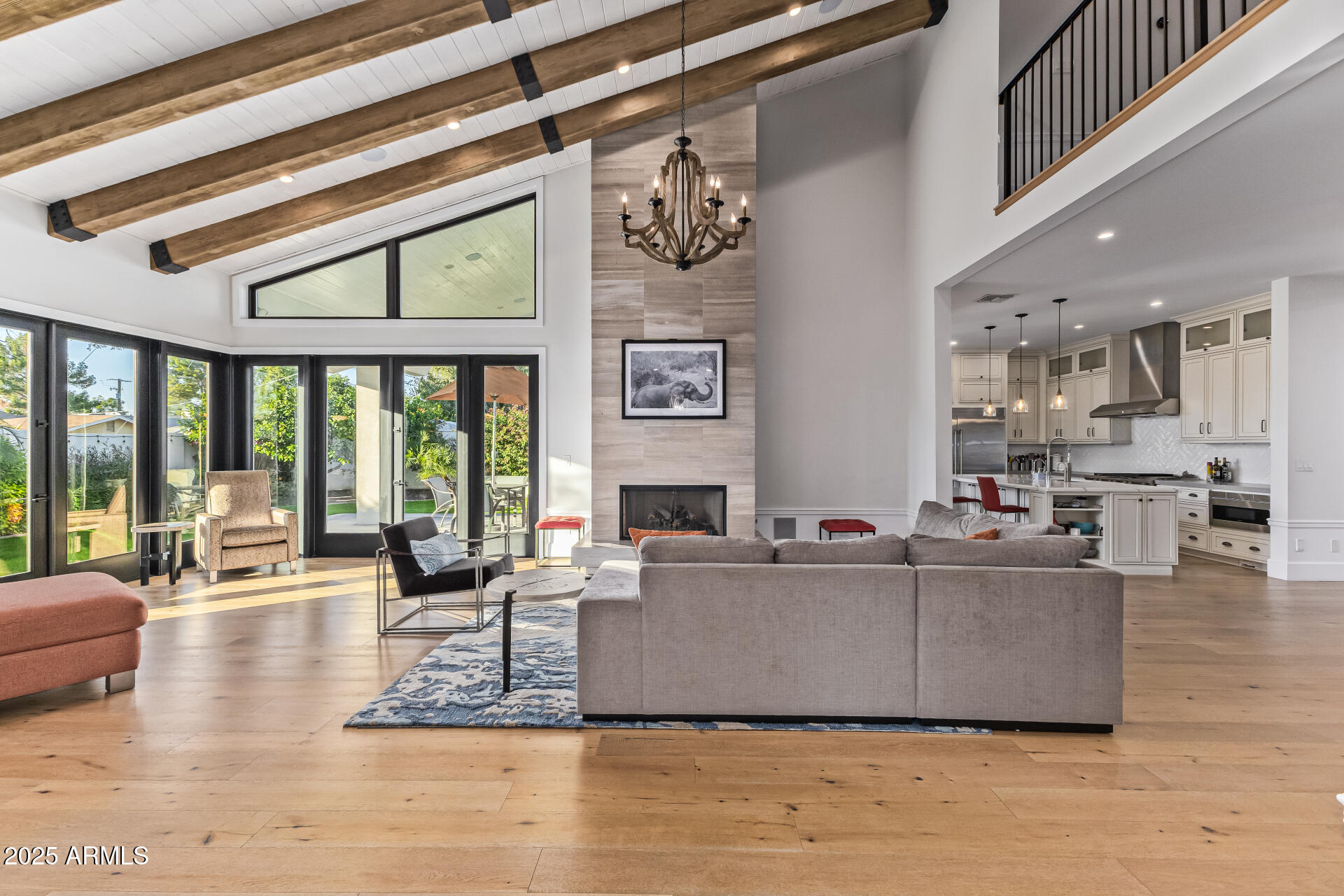 3810 East Campbell Avenue Phoenix, AZ 85018 - Photo 3 of 41 a living room with fireplace furniture and a large window
