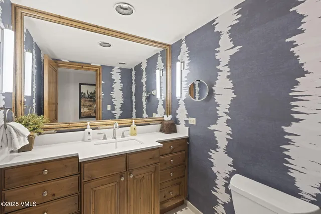 a room with lots of furniture and clutter