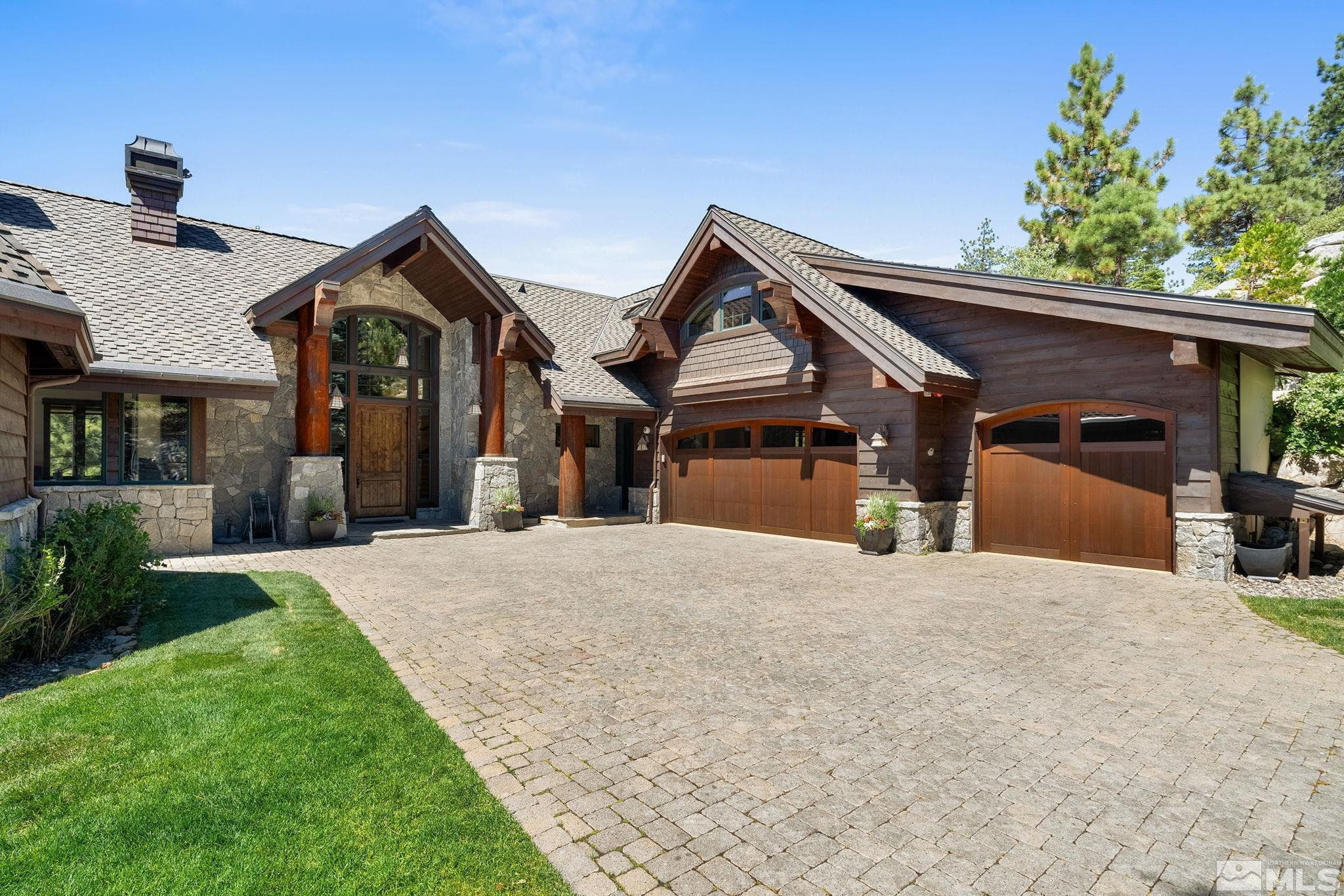 797 Ida Court Incline Village, NV 89451 - Photo 2 of 39 a front view of a house with a yard