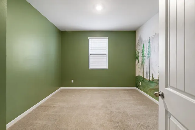 a view of a room that has a window in it