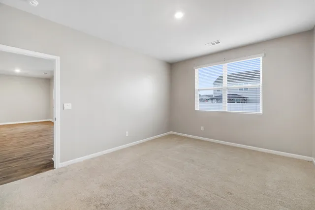 a bathroom with a granite countertop sink mirror and double