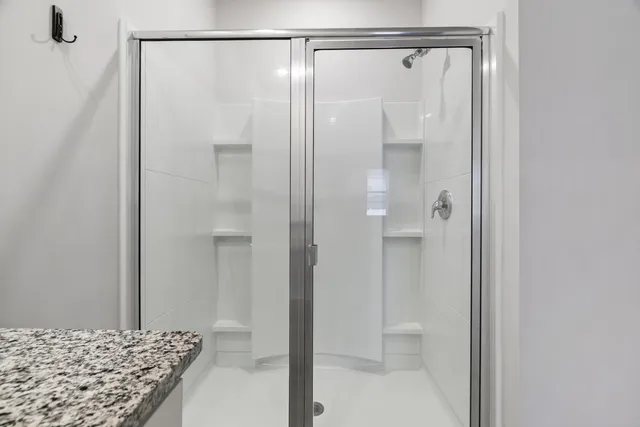 a swimming pool with outdoor seating and yard