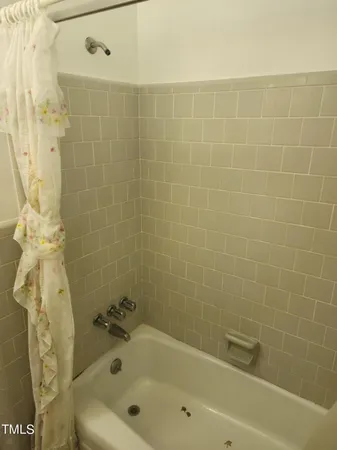 a bathroom with a bathtub