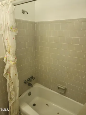 a bathroom with a bathtub