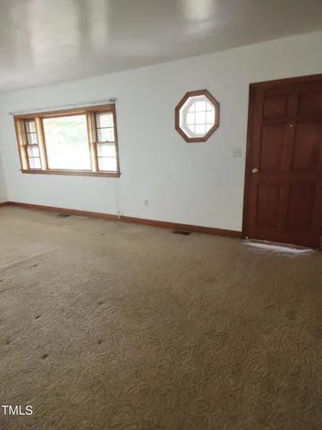 an empty room with a window