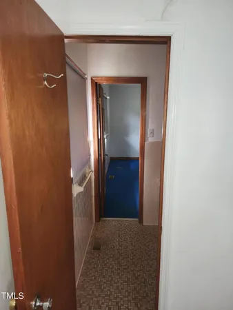 a bathroom with a toilet and a sink