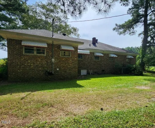 a view of a garden with a tree