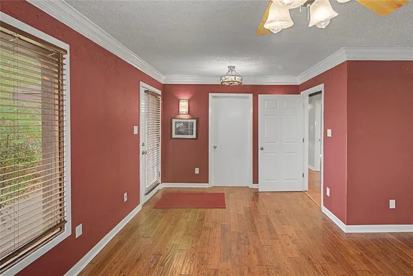 a view of a livingroom with wooden floor