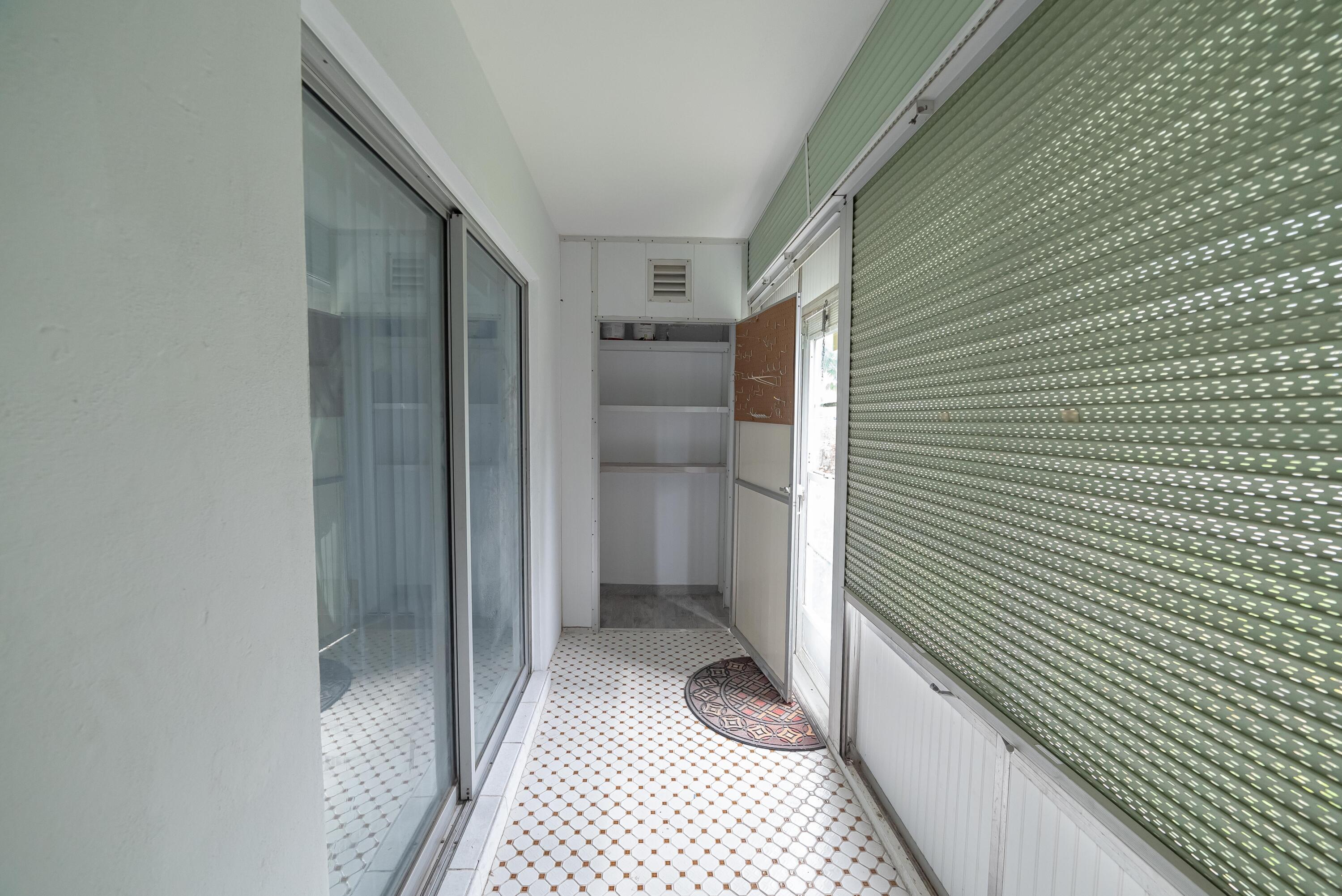 53 Lyndhurst East, Unit C Deerfield Beach, FL 33442 - Photo 23 of 23 a bathroom with a shower