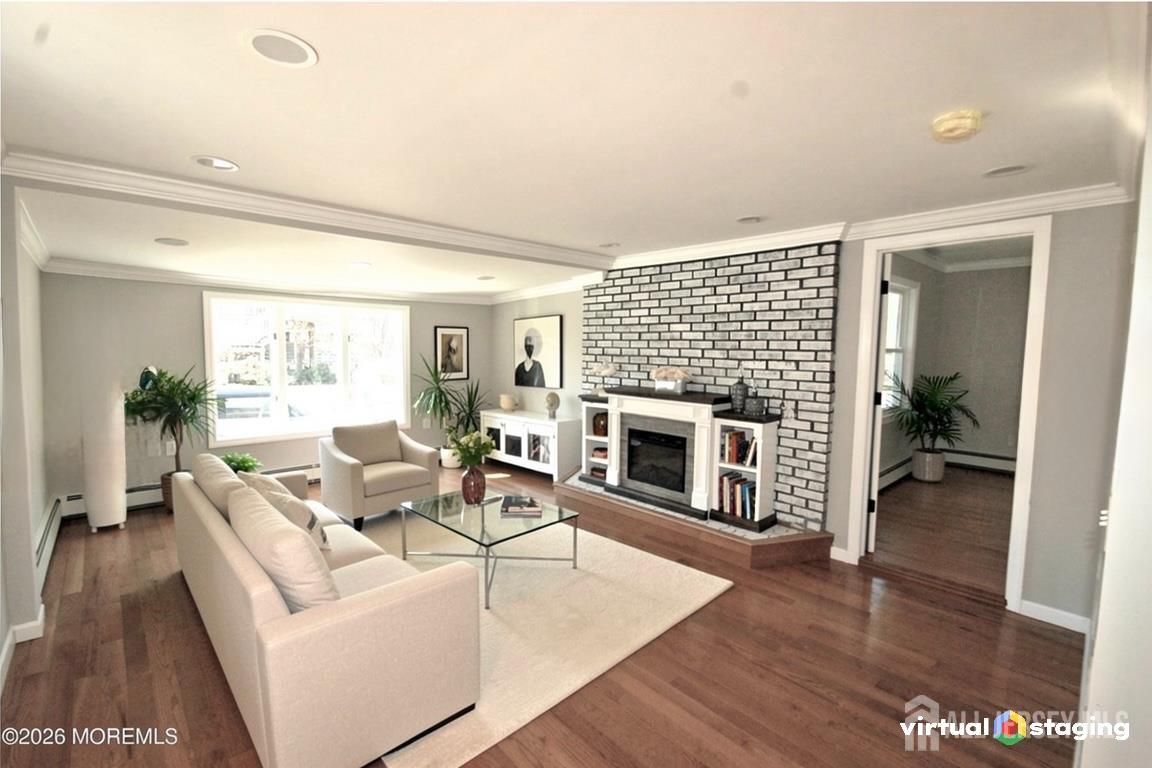 807 6th Street Union Beach, NJ 07735 - Photo 15 of 44 a living room with furniture and a fireplace