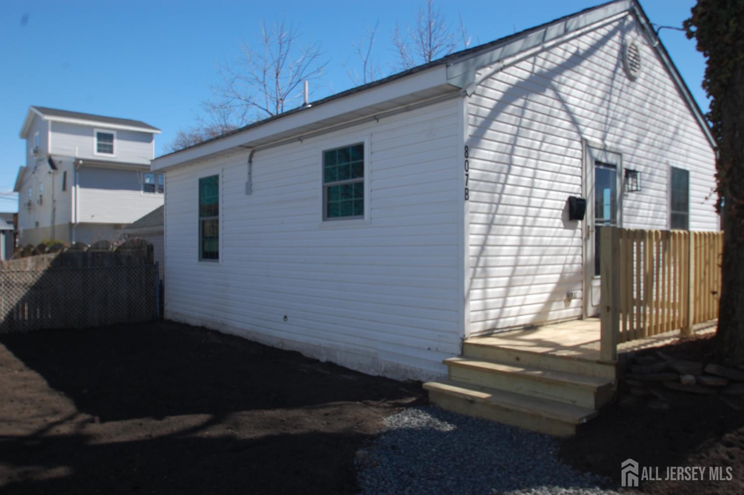 807 6th Street Union Beach, NJ 07735 - Photo 28 of 44 a view of house with backyard