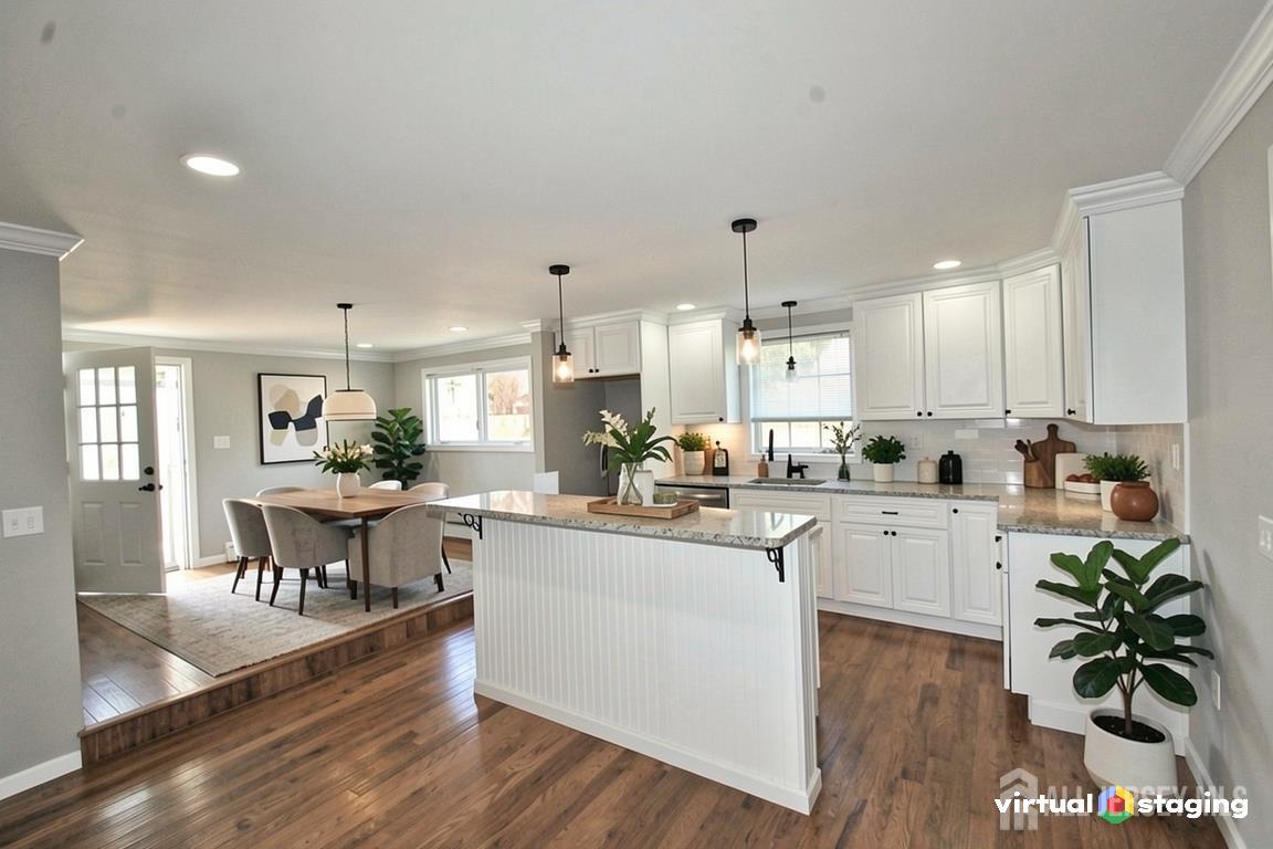 807 6th Street Union Beach, NJ 07735 - Photo 6 of 44 a kitchen with white cabinets and counter space
