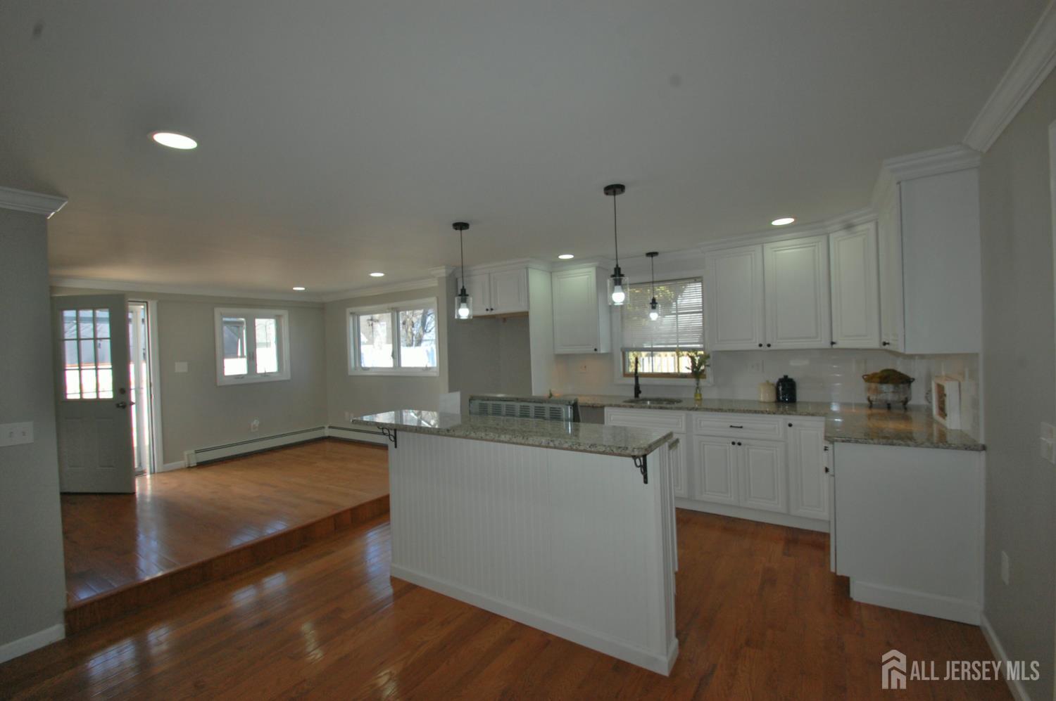 807 6th Street Union Beach, NJ 07735 - Photo 7 of 44 a kitchen with lots of counter space and appliances