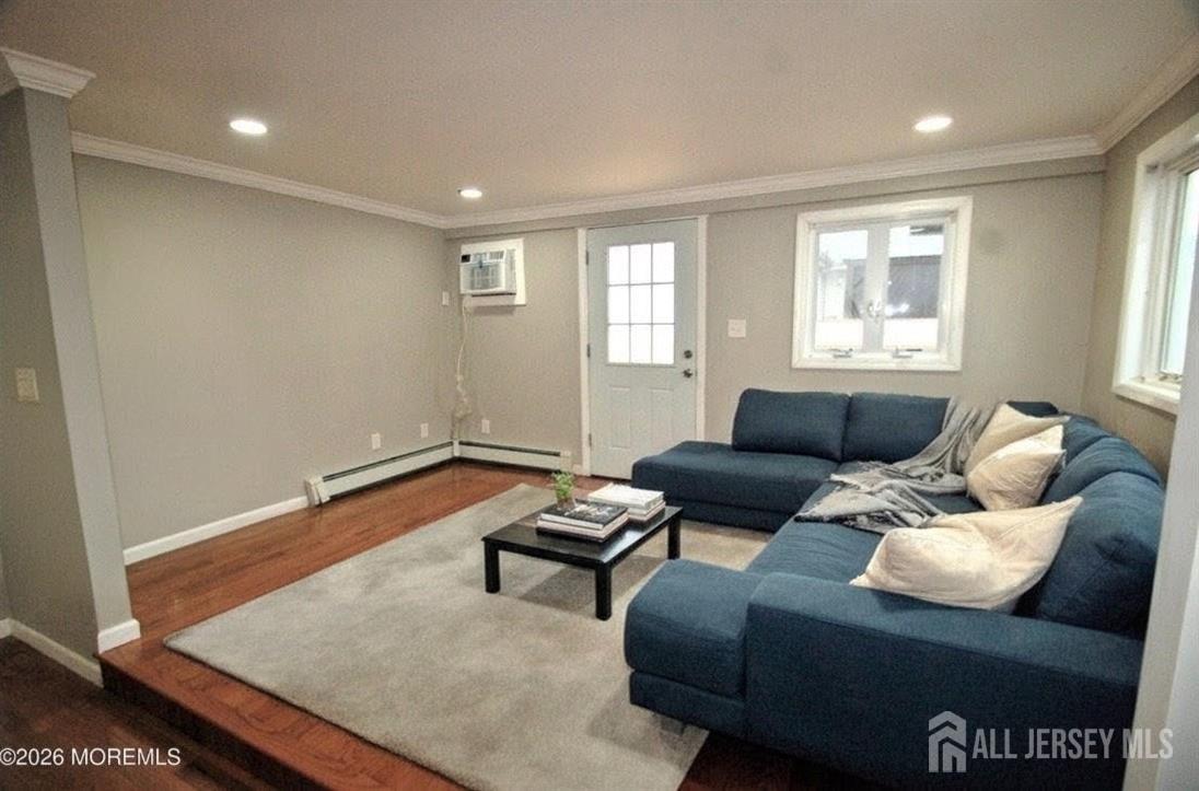 807 6th Street Union Beach, NJ 07735 - Photo 10 of 44 a living room with furniture and a window