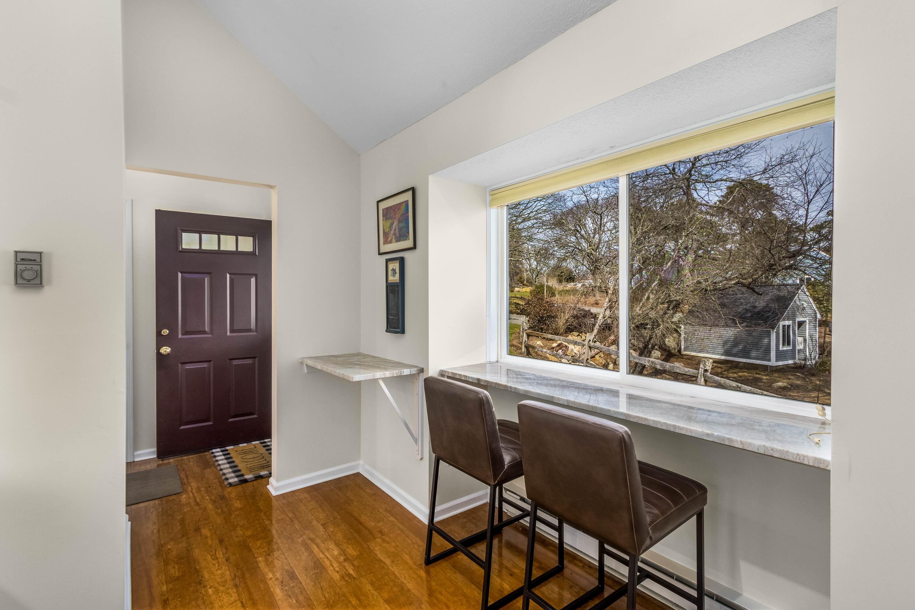 48 Middlecott Lane, Unit 48 Brewster, MA 02631 - Photo 4 of 36 a view of a workspace room with furniture and windows